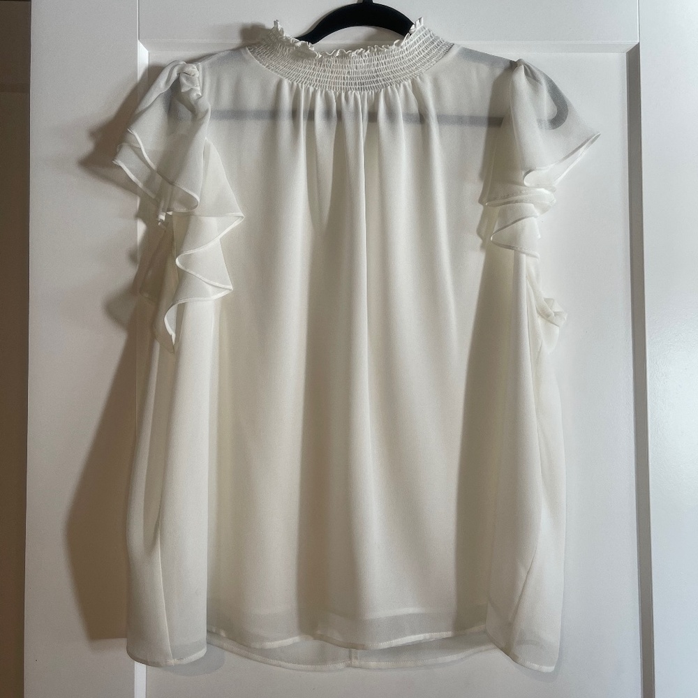 1 state white blouse